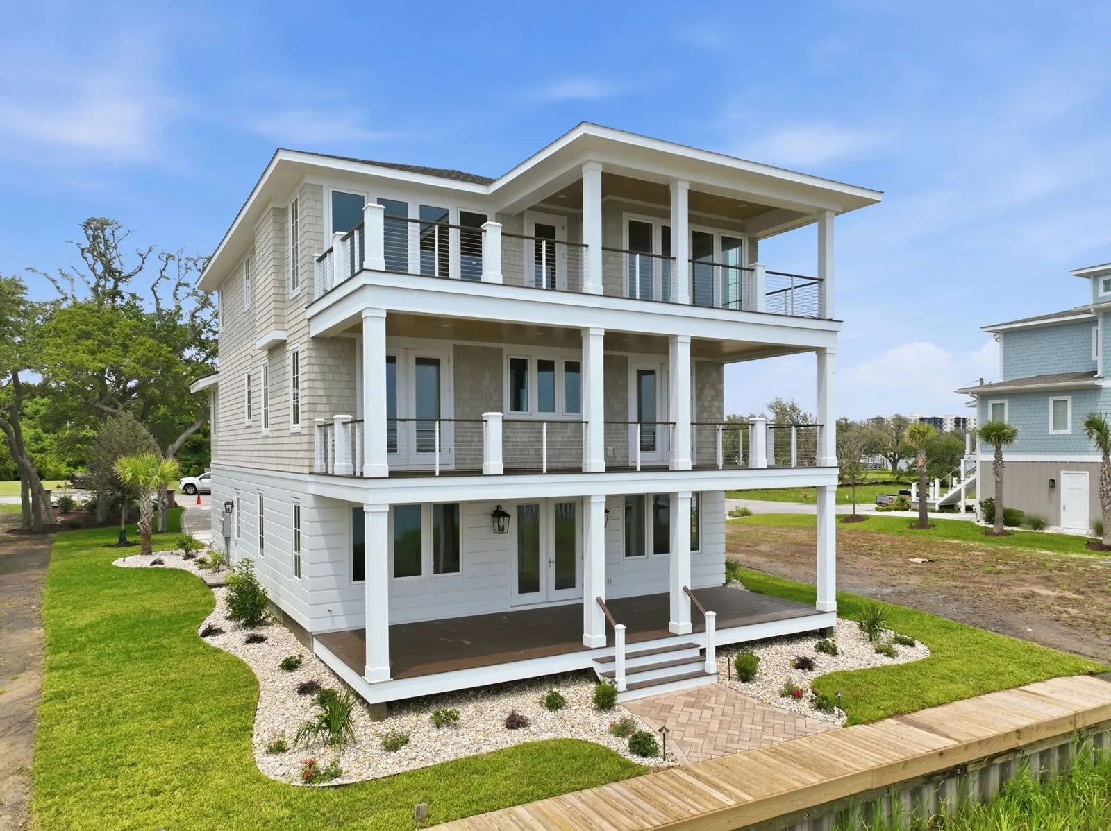 Rear elevation with covered porches on all three levels