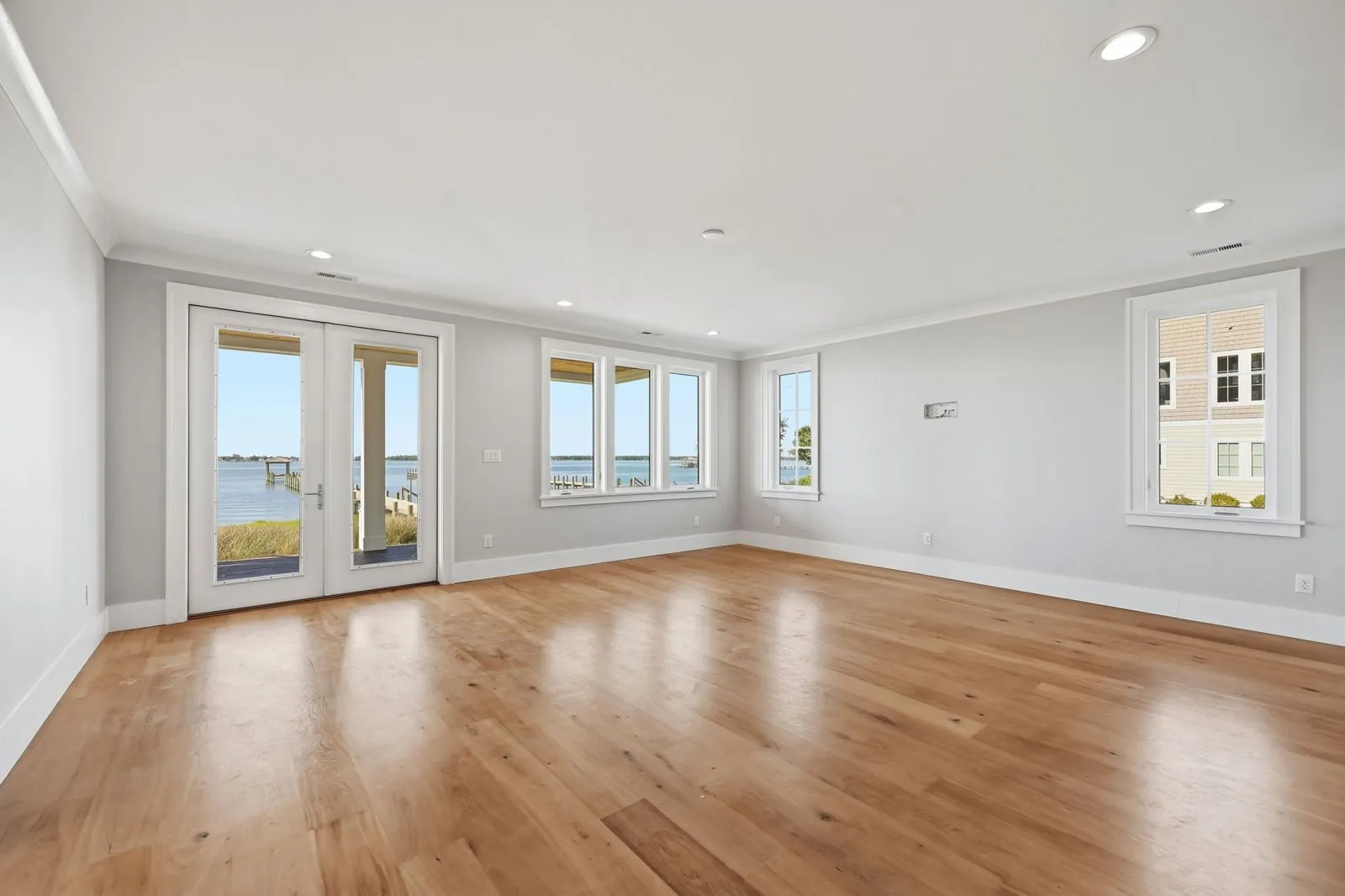 Room with French doors to the covered porch